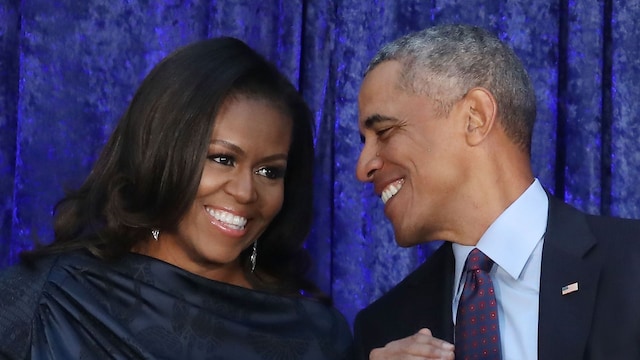 Michelle and Barack Obama at the unveiling of their official portraits in February 2018