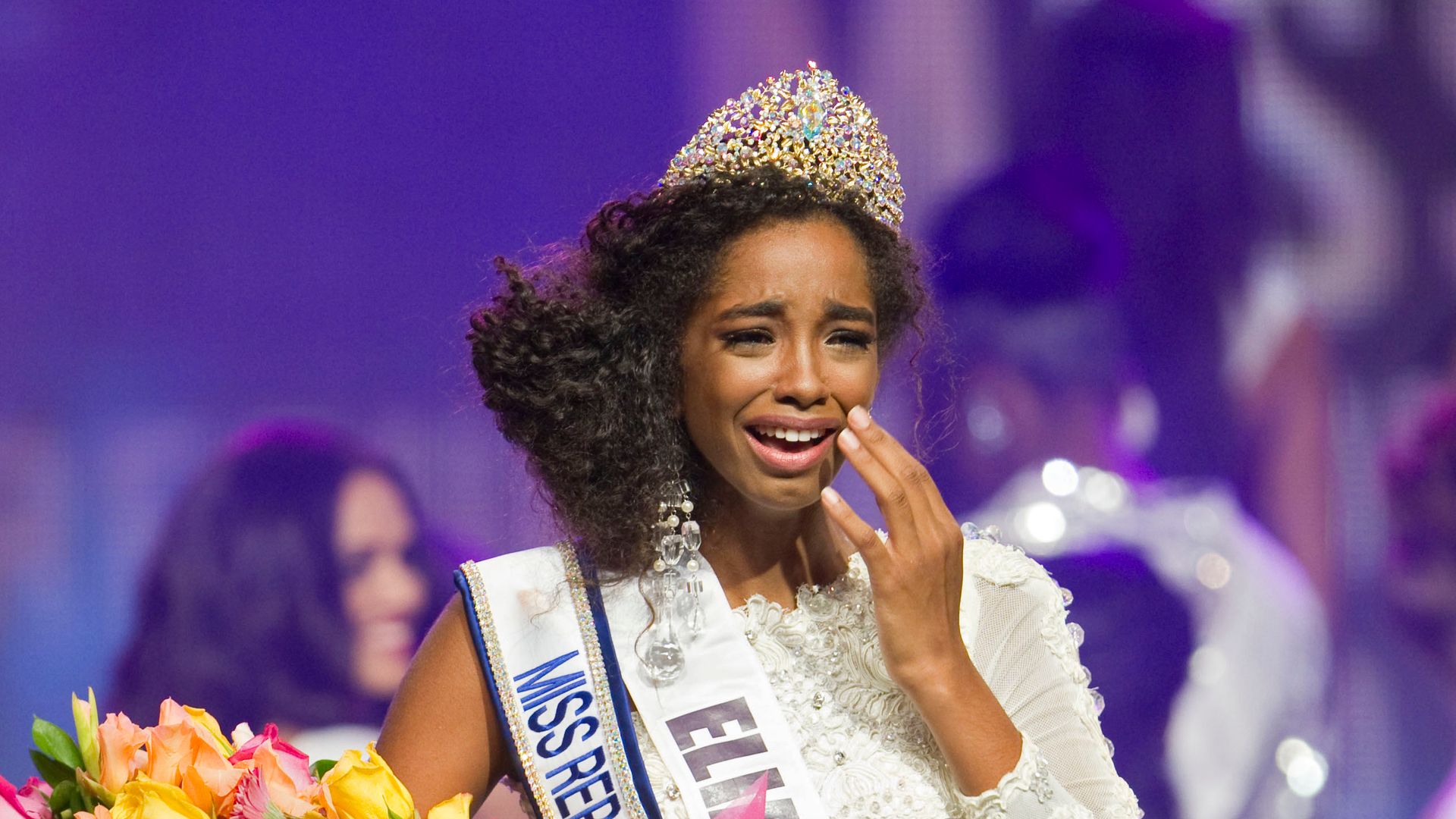 Yaritza Reyes, 19, cries after being crowned as Miss Dominican Republic 2013 in Punta Cana, Dominican Republic on August 3, 2013. Reyes will represent the country in the Miss Universe competition in Moscow. AFP PHOTO / ERIKA SANTELICES        (Photo credit should read ERIKA SANTELICES/AFP via Getty Images) 