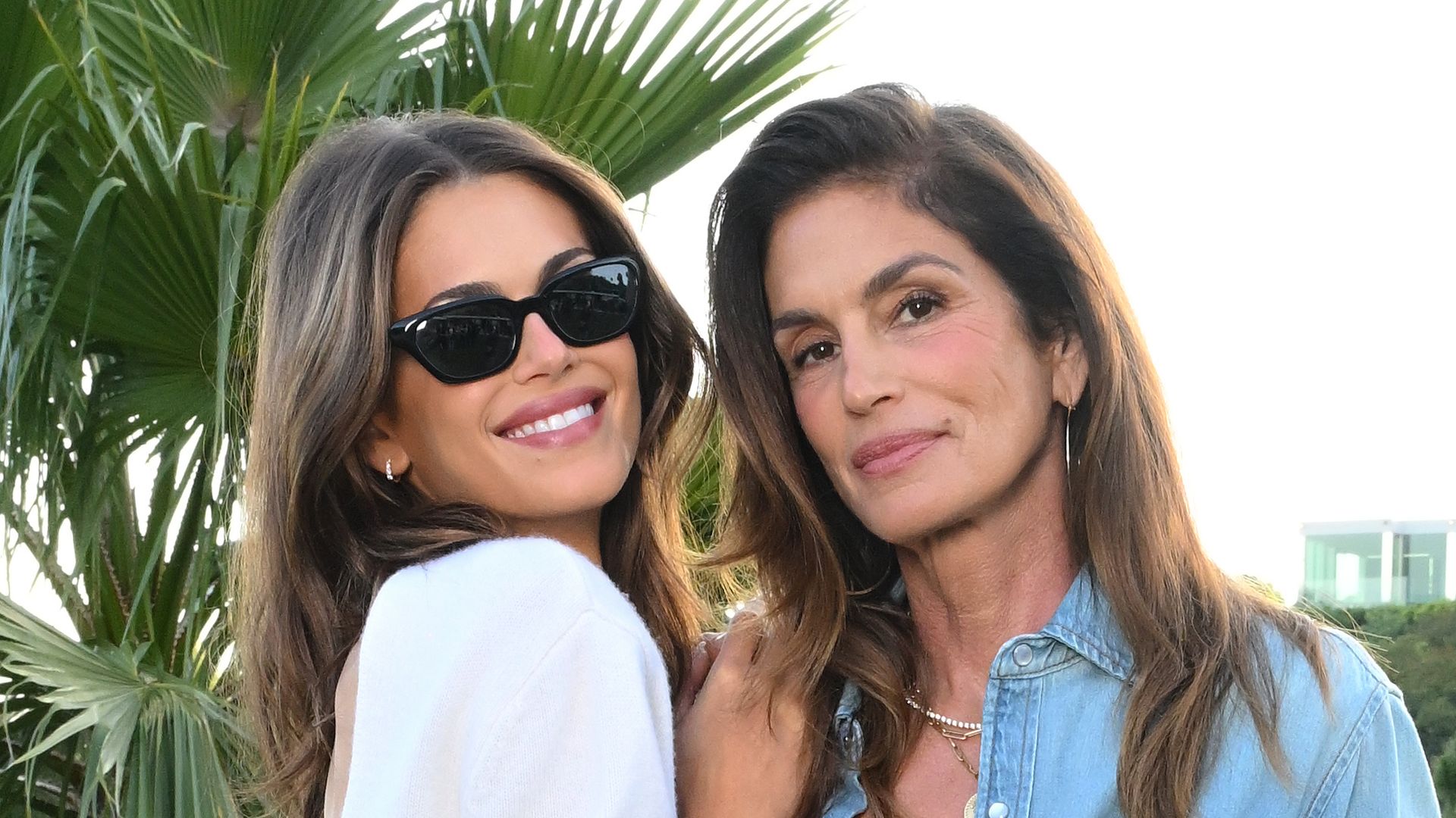 Kaia Gerber and Cindy Crawford twin in matching black gowns at Taylor Swift's wedding