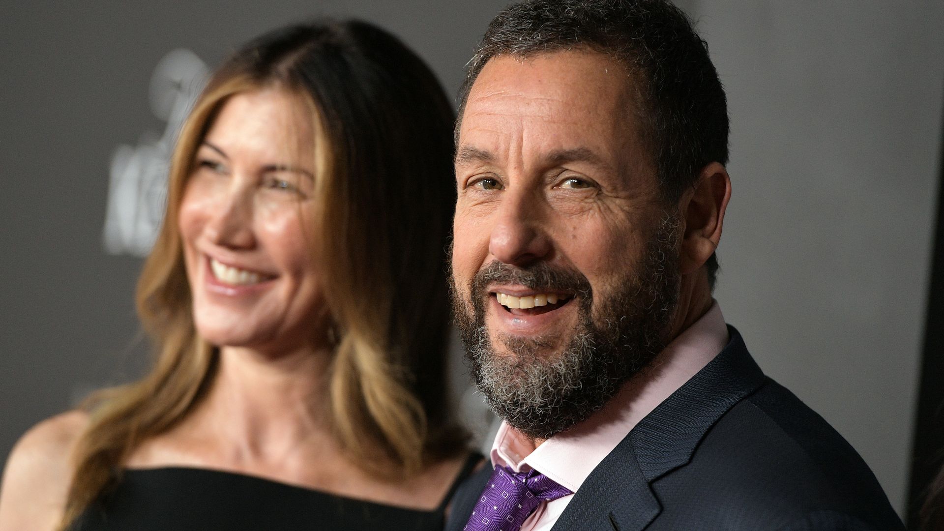 Jackie Sandler and Adam Sandler attend Netflix's "Jay Kelly" Los Angeles premiere
