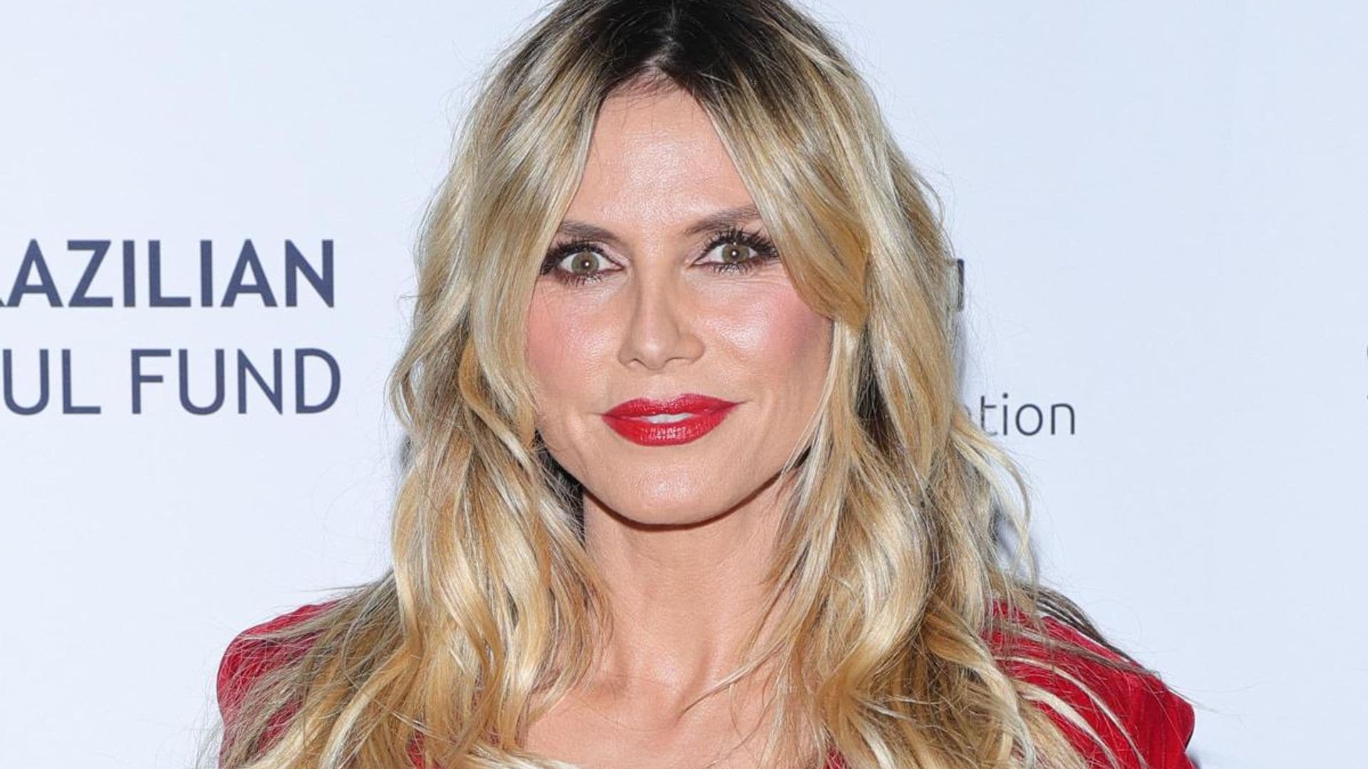 Heidi Klum shows off her amazing body in an itty bitty bikini in France