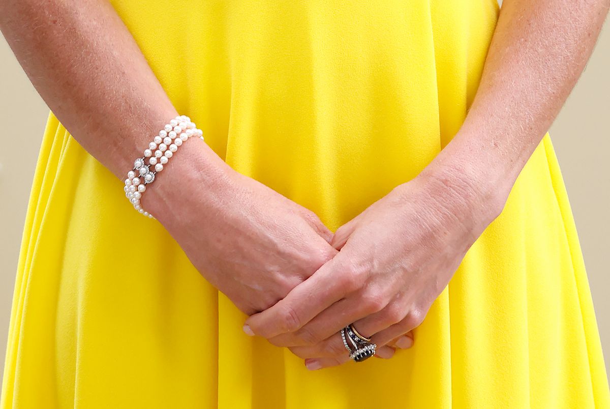 Kate wears Diana’s Nigel Milne bracelet, a delicate design featuring three rows of pearls accented with pearl and diamond spacers.