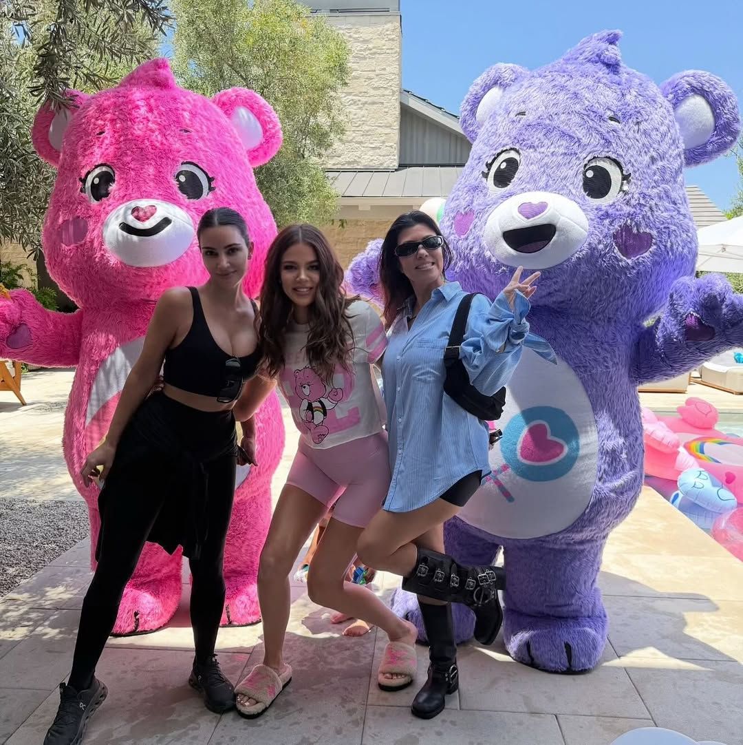 Kim and Kourtney were there to shower her with love