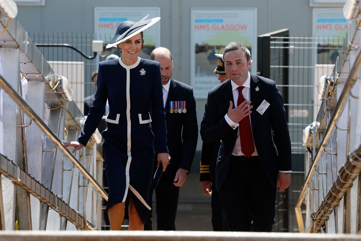 TOPSHOT - Britain's Catherine, Princess of Wales (L) and Britain's Prince William, Prince of Wales (2L) attend the naming ceremony for HMS Glasgow, at the BAE Systems shipyard in Scotstoun, Glasgow, Scotland on May 22, 2025. (Photo by Andy BARR / POOL / AFP) (Photo by ANDY BARR/POOL/AFP via Getty Images)          