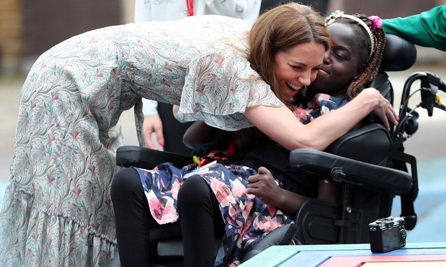Kate Middleton looks summery at workshop, named patron of Royal Photographic Society