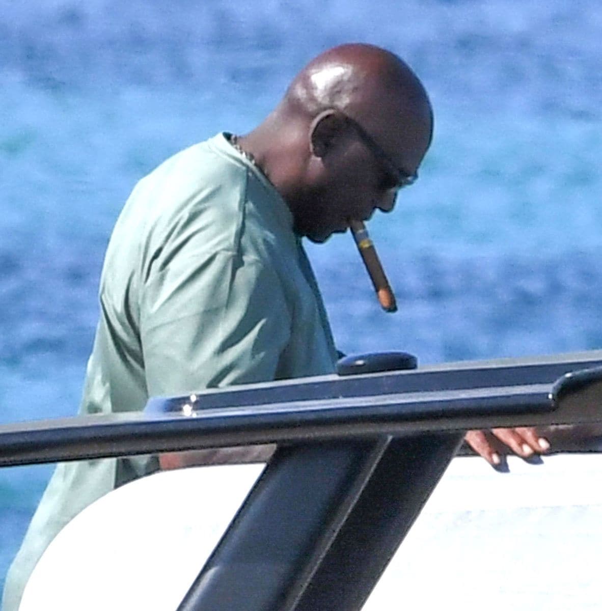  MJ puffing on his signature cigar like the GOAT he is.