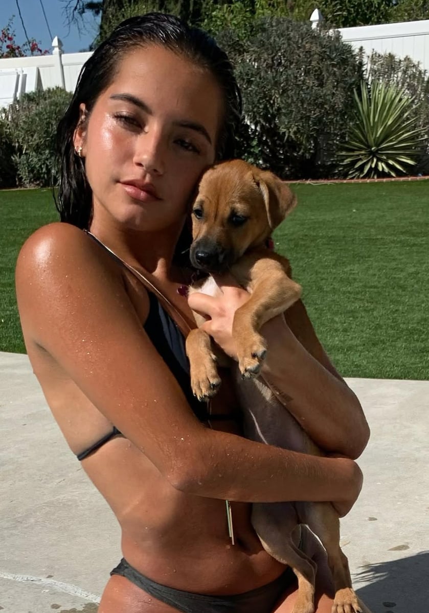 Isabela Merced and her dog Canela