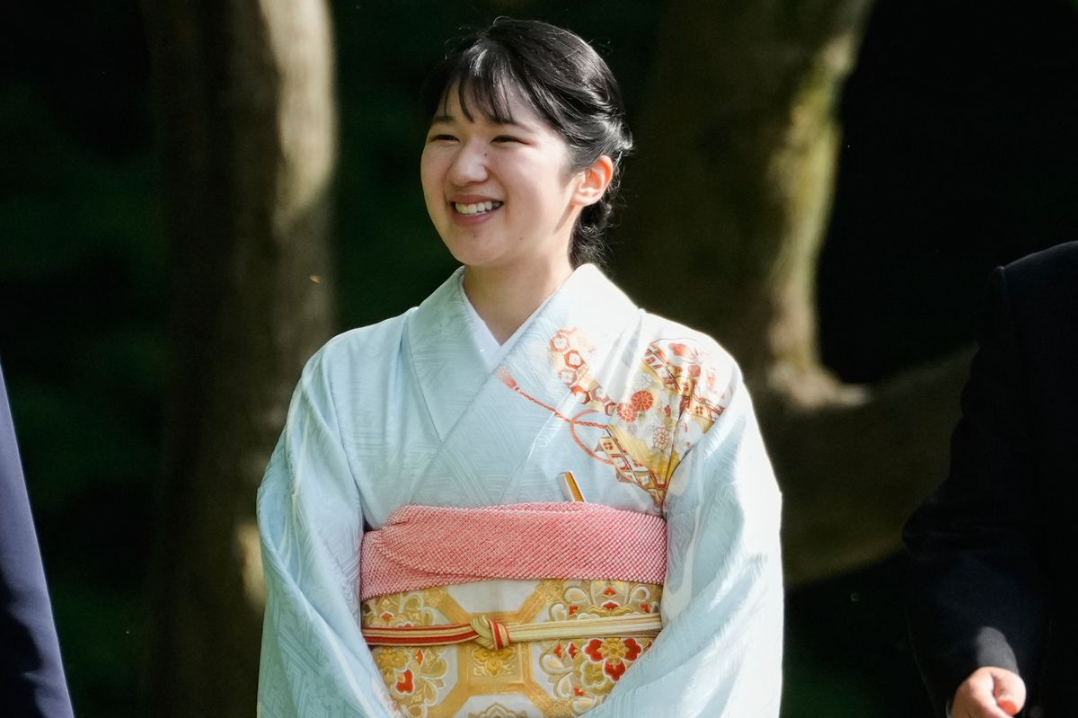 Japan's Princess Aiko smiles during the spring garden party at the Akasaka Palace imperial garden in Tokyo on April 22, 2025