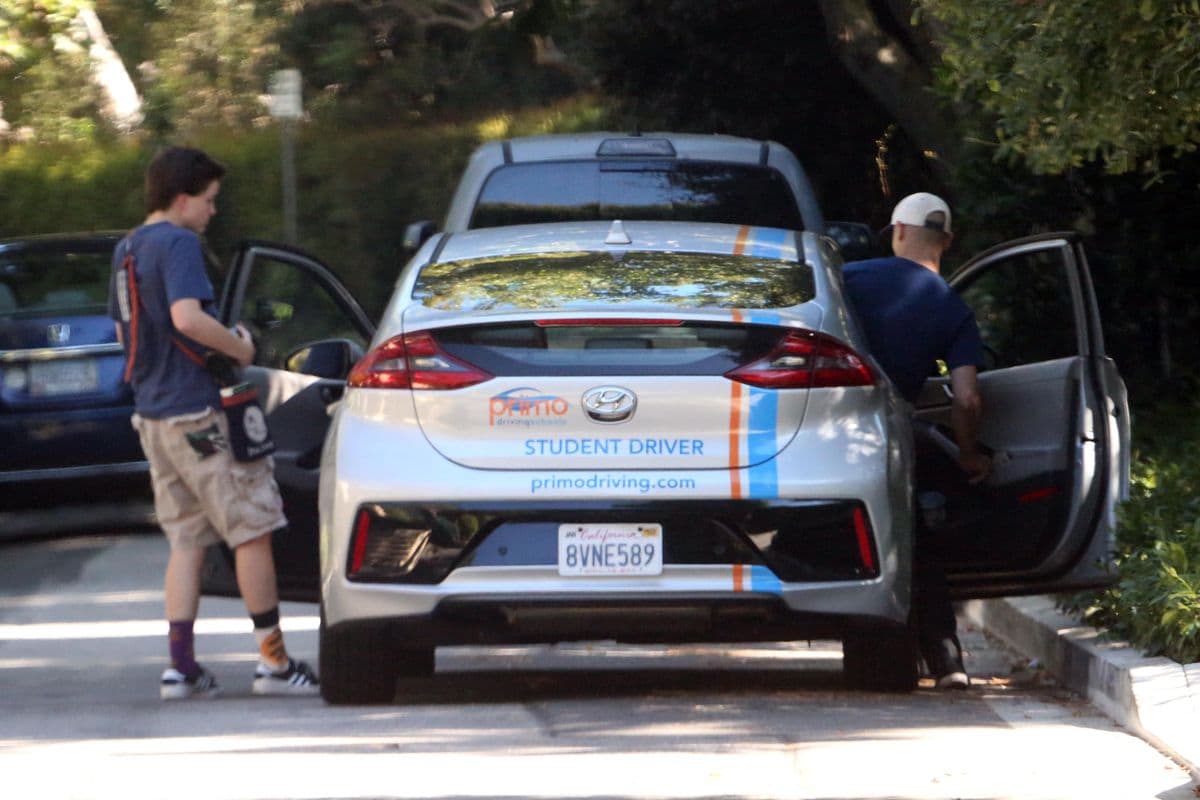 Fin Affleck is seen jumping into the driver's seat as they take driving lessons on 28 Aug 2024.