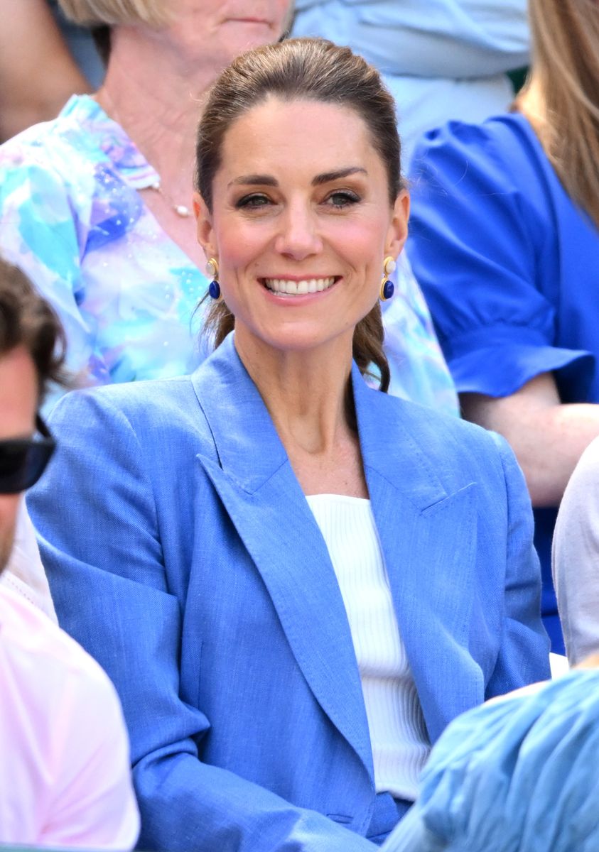 The Princess of Wales completed her Wimbledon look with symbolic lapis lazuli and moonstone earrings.