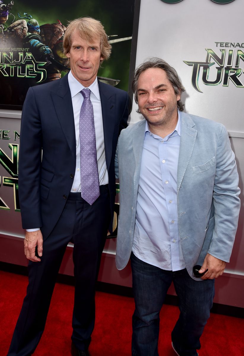 WES Producer Michael Bay (L) and Paramount Film Group President Adam Goodman attend the premiere of Paramount Pictures' "Teenage Mutant Ninja Turtles" at Regency Village Theater on August 3, 2014 
