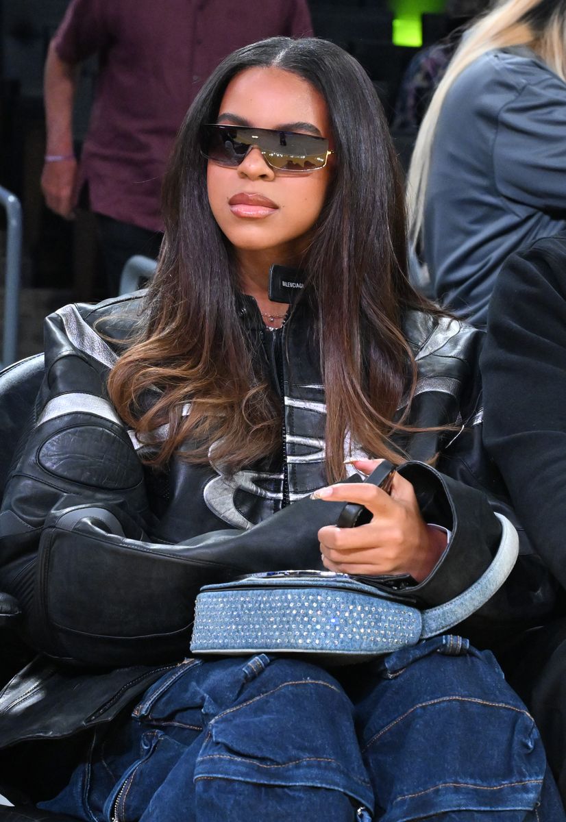 Blue Ivy Carter attends a basketball game between the Los Angeles Lakers and San Antonio Spurs.