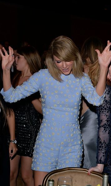 Taylor Swift was out of her seat dancing most of the night at Clive Davis' party.
Photo: Getty Images