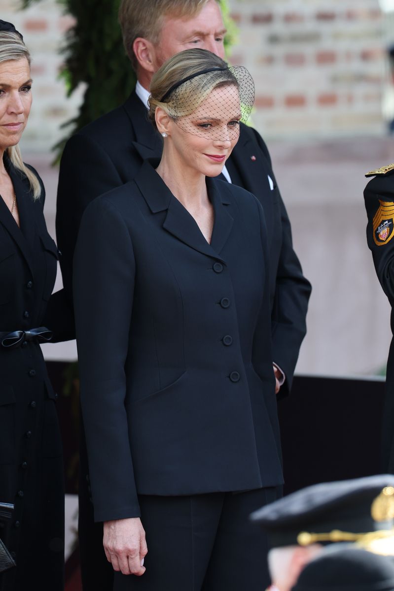Charlene’s head-to-toe black ensemble reflected the traditional color of royal mourning.
