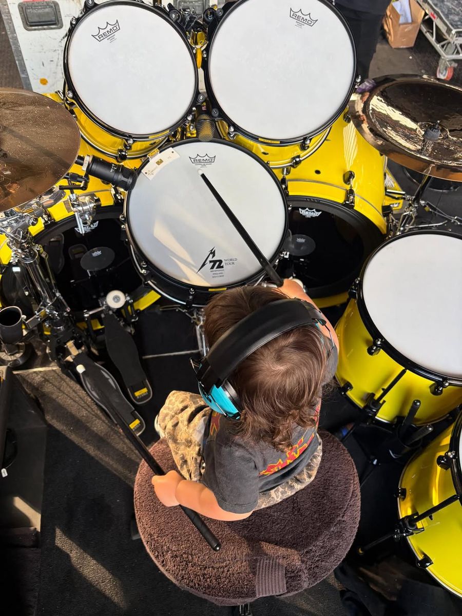Rocky took the stage before showtime and had some fun on dad's drums