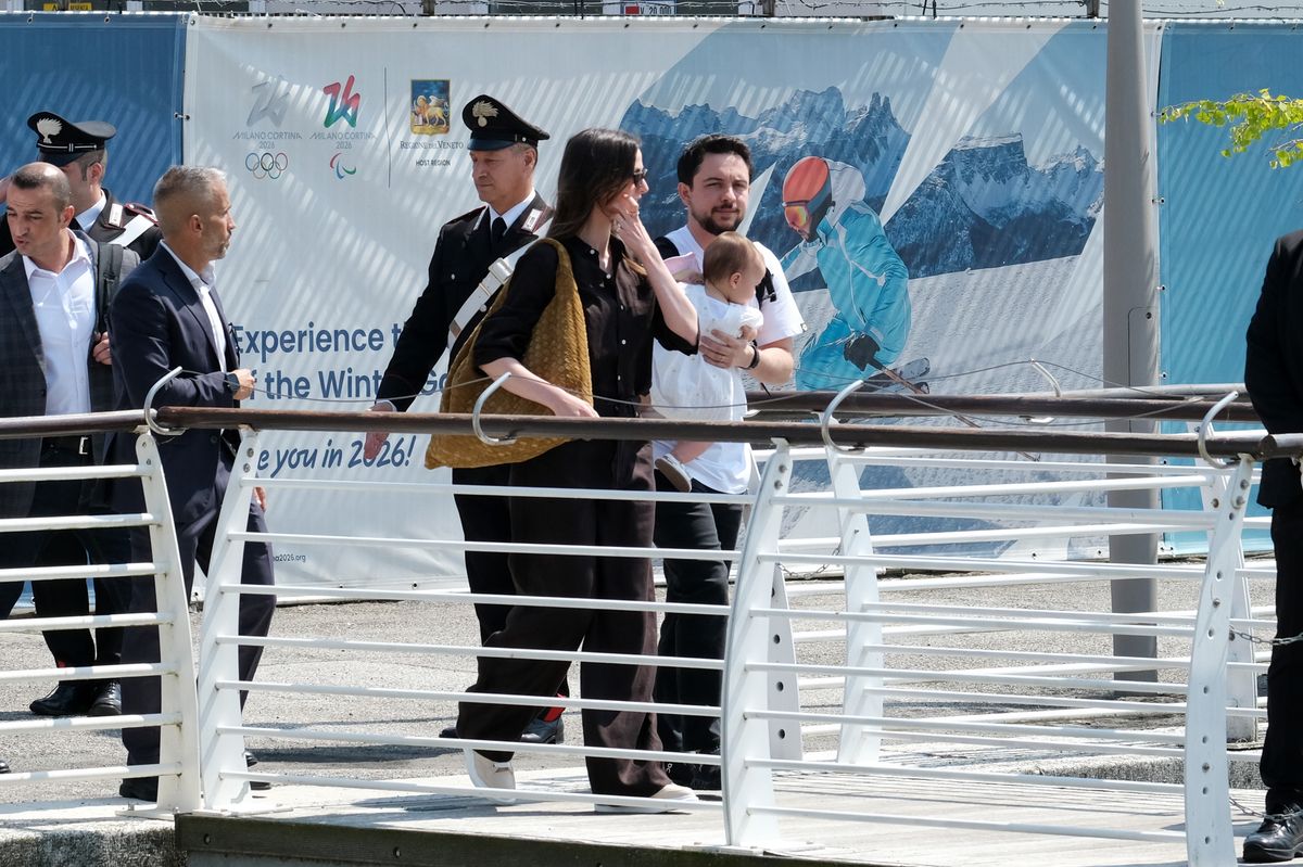 VENICE, ITALY - JUNE 26: Rajwa Al Hussein, Crown Prince of Jordan Hussein bin Abdullah and their daughter Iman Bint Hussein arrive at Venice Marco Polo airport ahead of Jeff Bezos and Lauren Sanchez Wedding on June 26, 2025 in Venice, Italy. (Photo by Stefano Mazzola/GC Images)