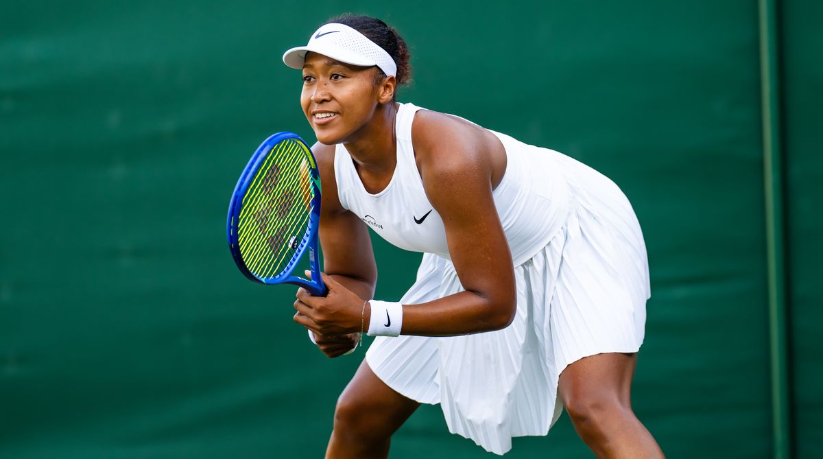Naomi Osaka of Japan in action against Talia GIbson of Australia during the first round on Day One of The Championships Wimbledon 2025 at All England Lawn Tennis and Croquet Club on June 30, 2025 in London, England 