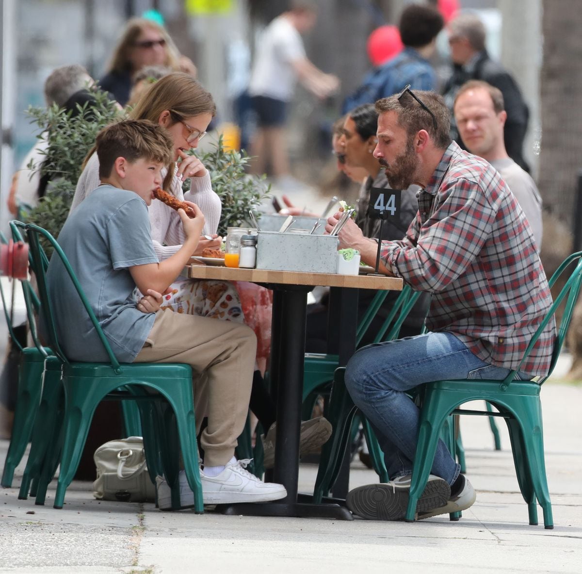 Violet, Samuel and Ben eating some lunch outfoors