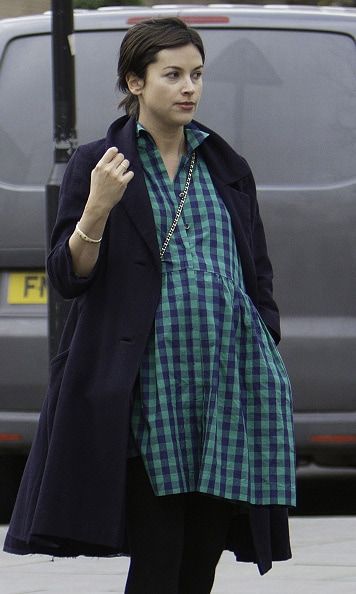 A heavily pregnant Amelia during an outing with Jamie and their daughter in London.
<br>
Photo: GC Images