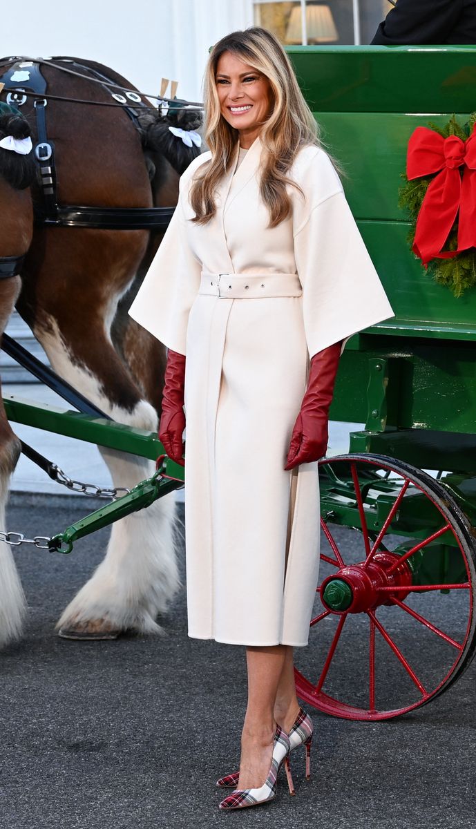 Melania Trump’s winter style: sleek coats, festive fashion, and red