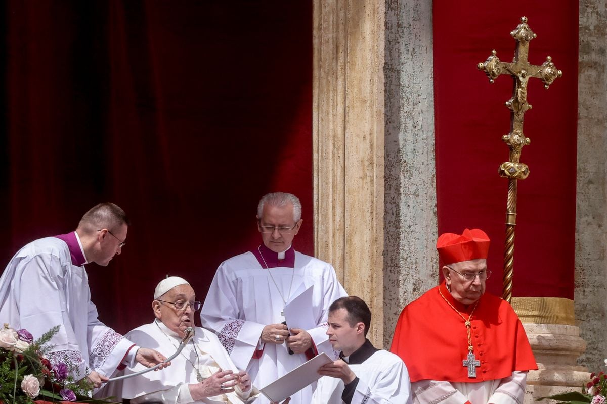 Pope Francis blesses the faithful at the end of the Urbi et Orbi Message to the World at the central Loggia of St. Peter's Basilica, on April 20, 2025 in Vatican City, Vatican.