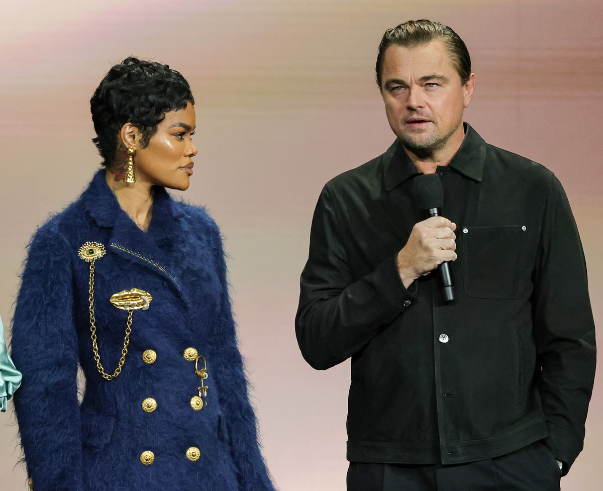 Teyana Taylor (L) and Leonardo DiCaprio promote the upcoming film "One Battle After Another"