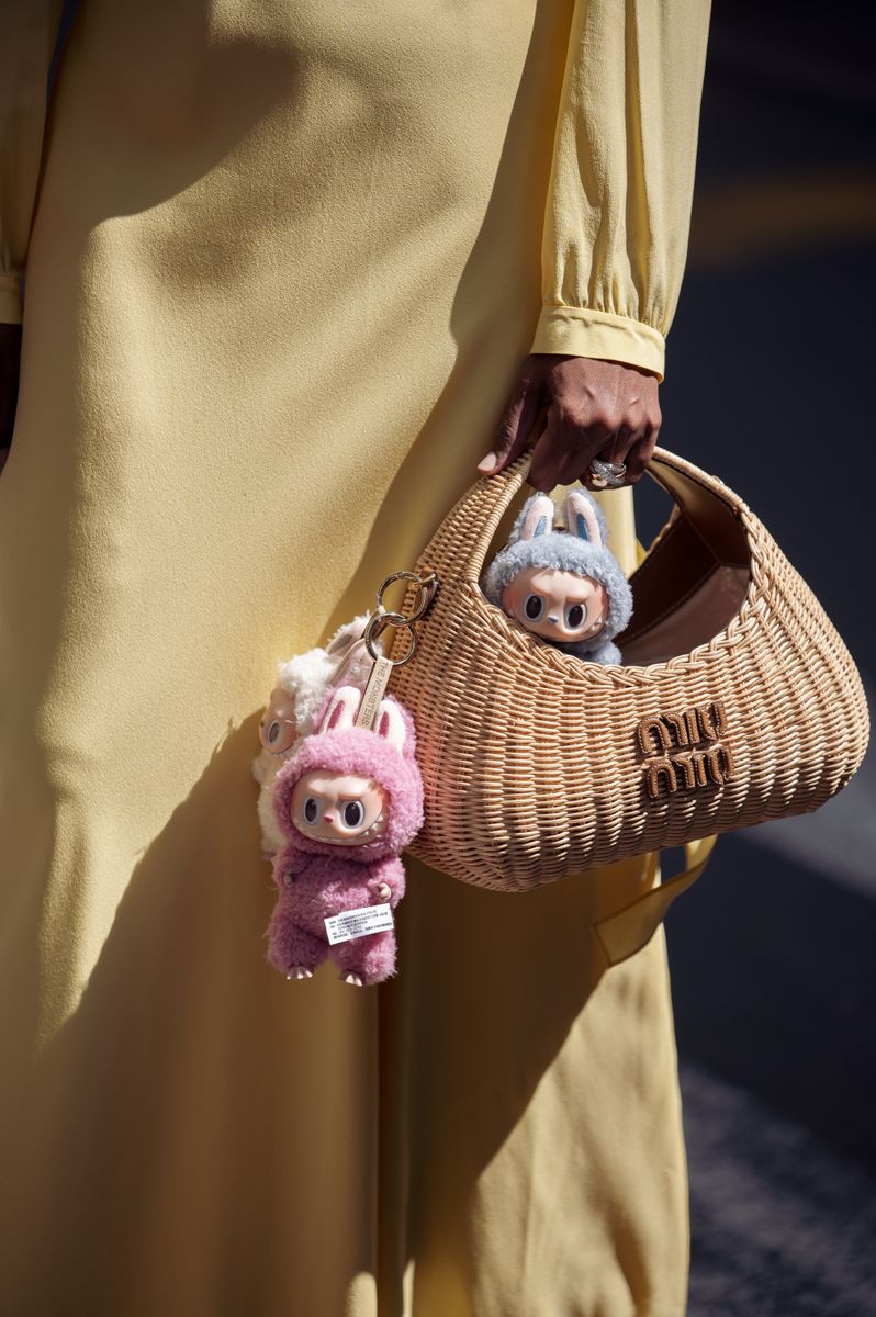  Zufi Alexander wears an all Miu Miu look with attached Labubu bag charms during day five of the 78th Cannes Film Festival