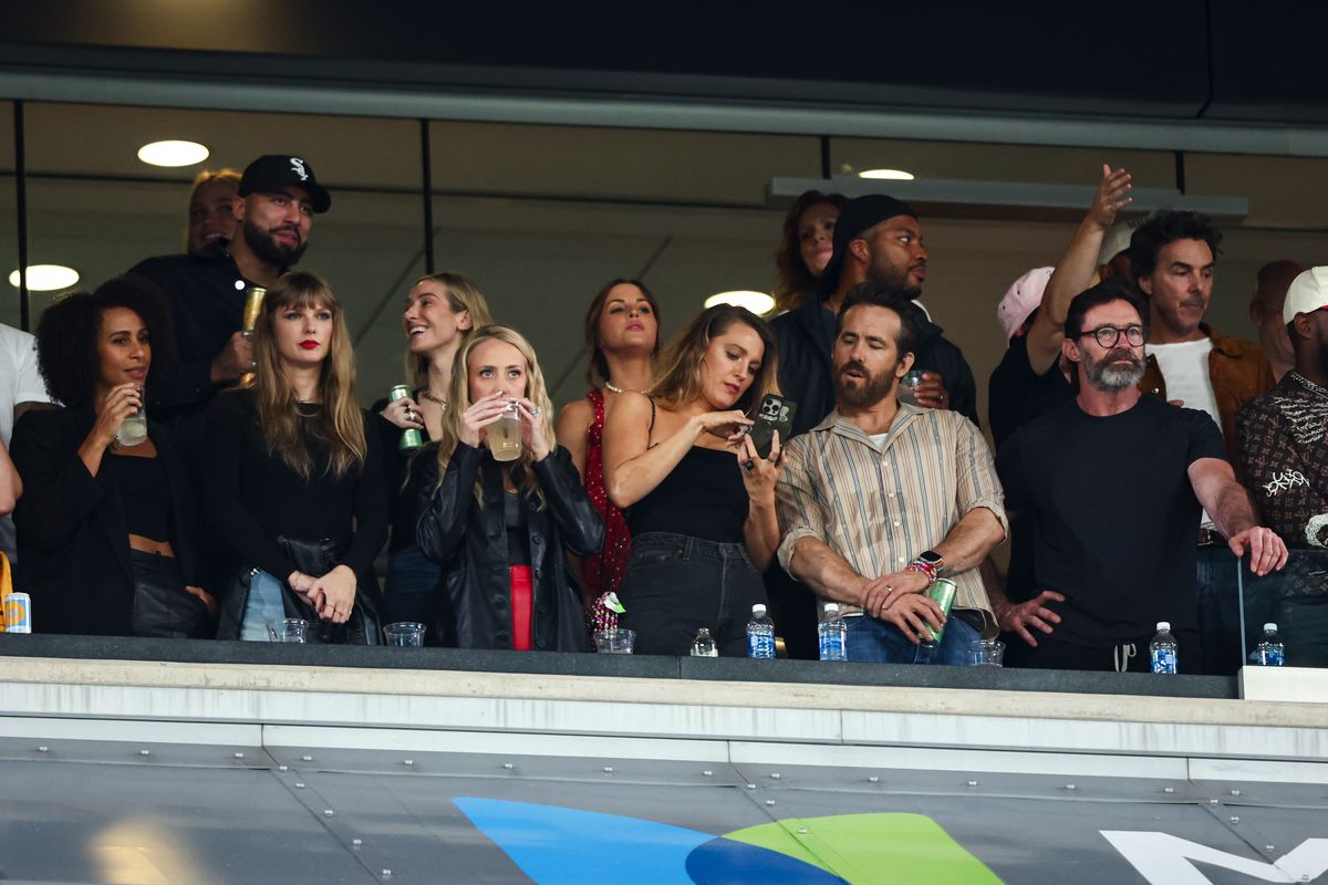 Taylor Swift, Brittany Mahomes, Blake Lively, Ryan Reynolds, and Hugh Jackman watch from the stands during an NFL football game between the New York Jets and the Kansas City Chiefs at MetLife Stadium on October 1, 2023 in East Rutherford, New Jersey. (Photo by Kevin Sabitus/Getty Images)