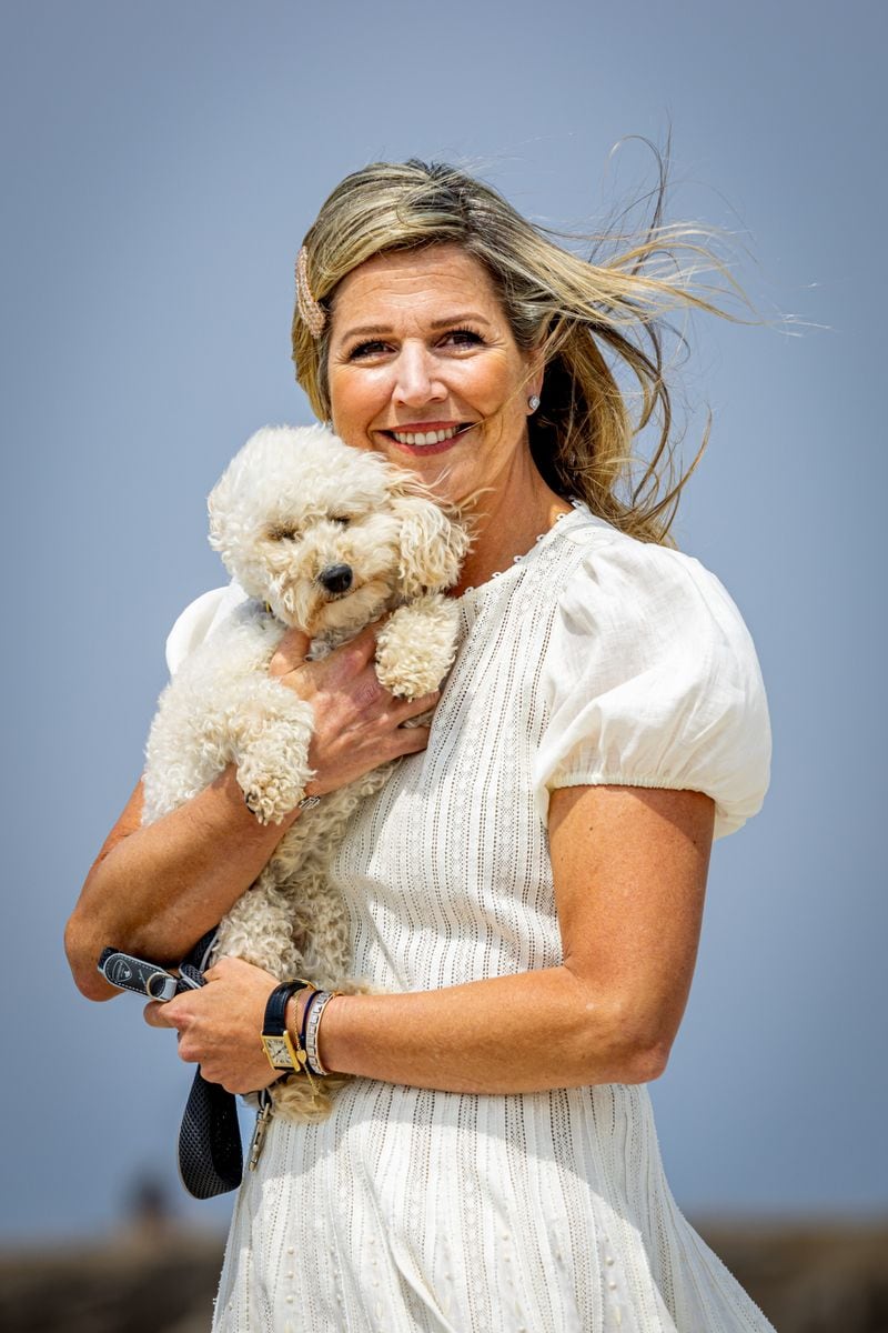 Queen Maxima of The Netherlands with her dog Mambo