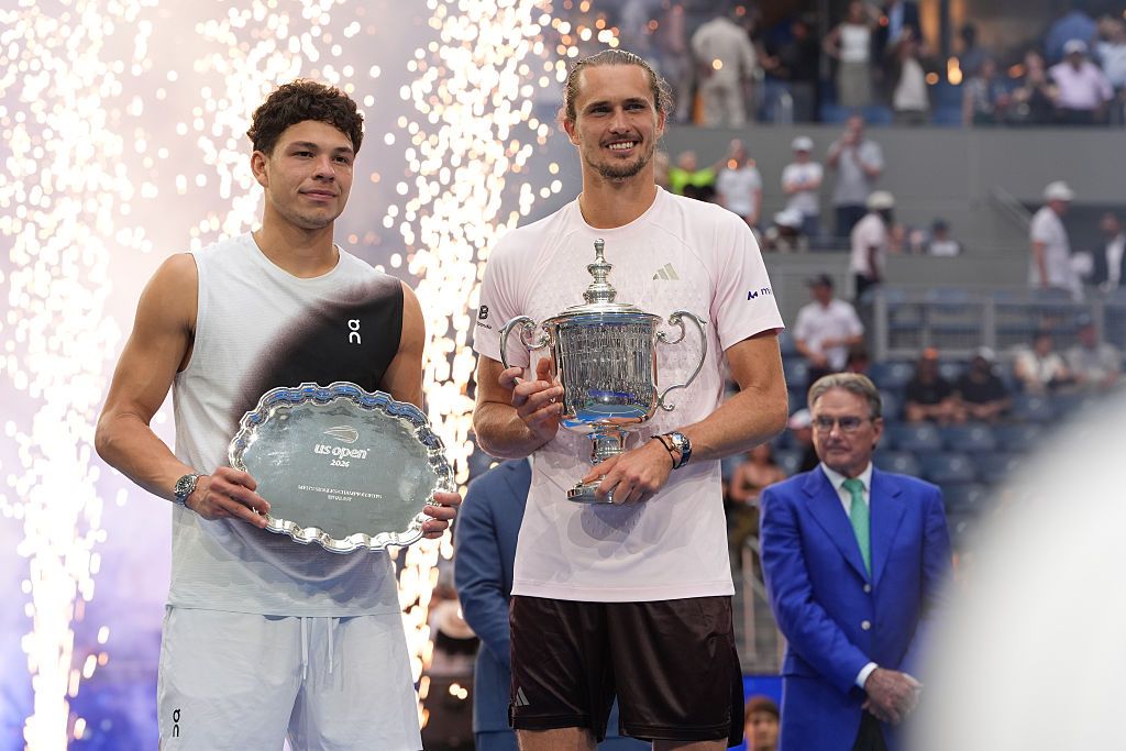 Alexander Zverev of Germany and Ben Shelton of the United States pose with their trophies following the Men's Singles Final match at USTA Billie Jean King National Tennis Center