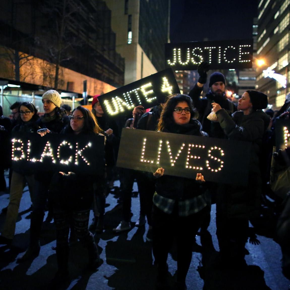 People march toward the West Side Highway in protest