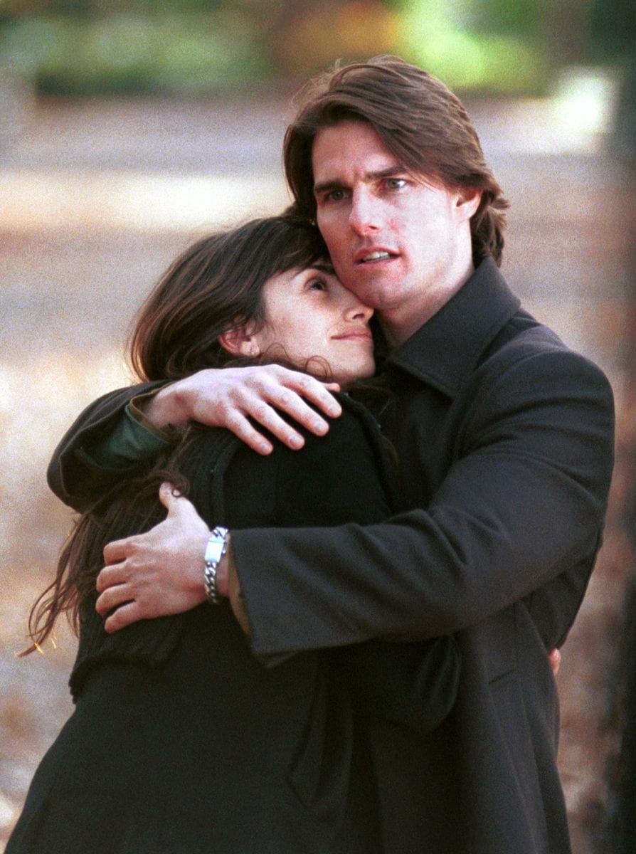 Actor Tom Cruise holds co-star Penelope Cruz in his arms on the set of  "Vanilla Sky" during filming in Central Park November 7, 2000 in New York City. (Photo by Mario Magnani/Liaison)