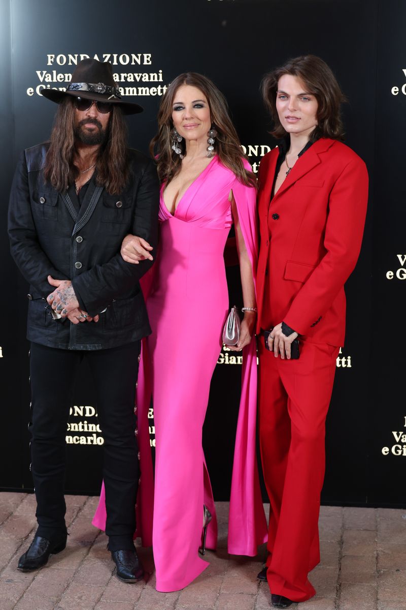 ROME, ITALY - MAY 24: Billy Ray Cyrus, Elizabeth Hurley and Damian Hurley attend the "Orizzonti | Rosso" Exhibition Opening Dinner at Palazzo Barberini on May 24, 2025 in Rome, Italy. (Photo by Elisabetta A. Villa/Getty Images)