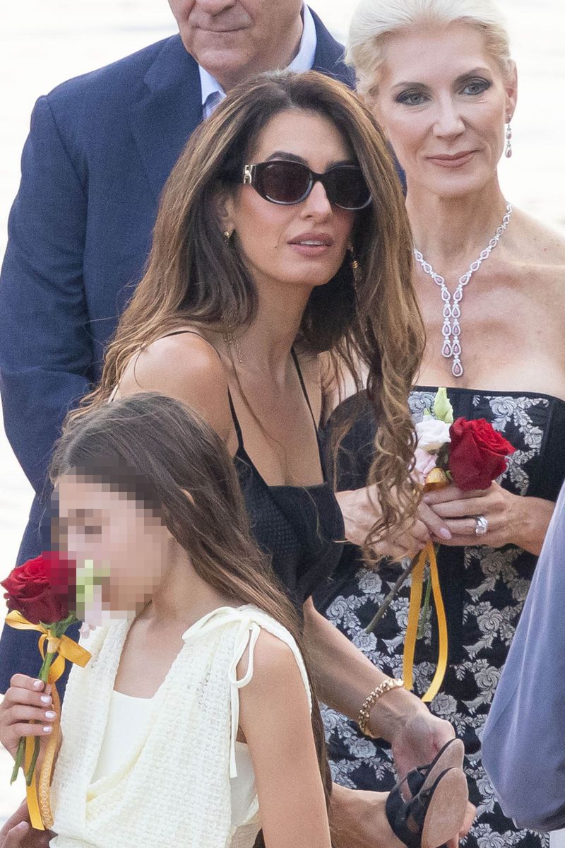 George and Amal Clooney make a rare appearance with twins Ella and Alexander as Amal stuns in elegant black dress