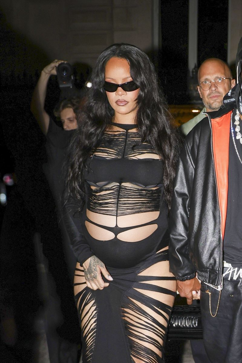 Rihanna accessorized the all-black ensemble with pointed-toe pumps, statement sunglasses