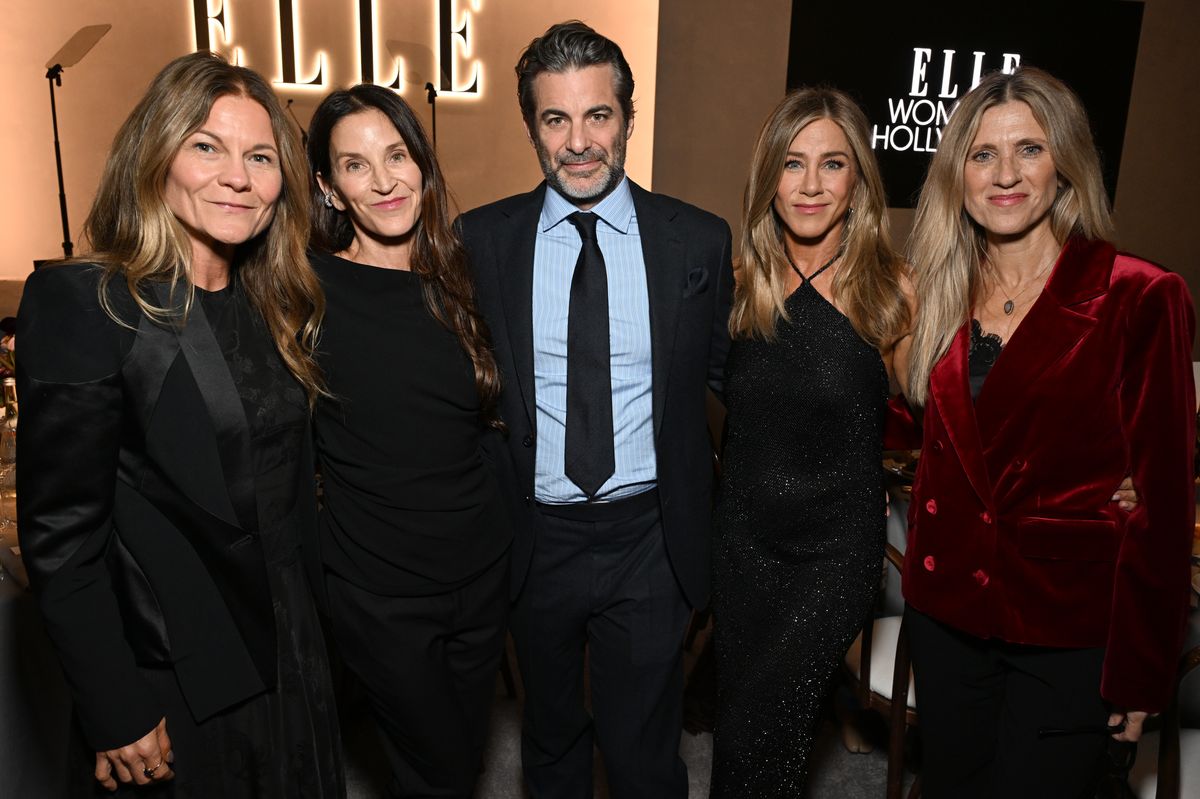 Kristin Hahn, Amanda Anka, Jim Curtis, Jennifer Aniston, wearing Ralph Lauren, and Andrea Bendewald