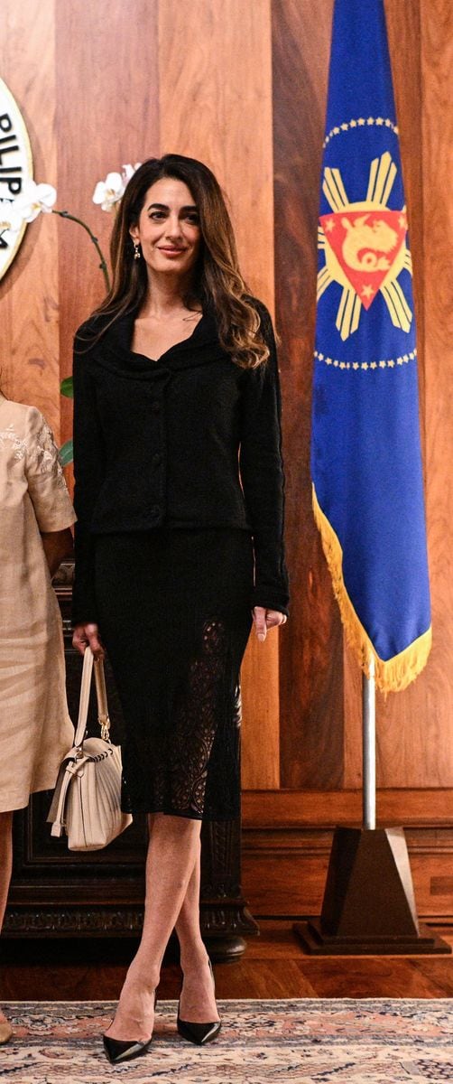 Amal Clooney shifted into diplomatic elegance over the weekend as she touched down in Manila alongside husband George Clooney.