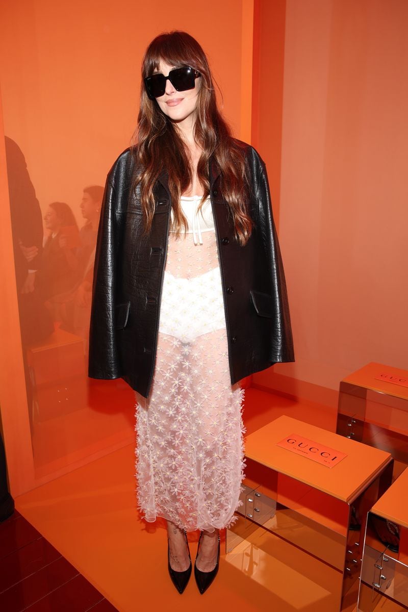 Dakota Johnson is seen front row at the Gucci  Women's Spring Summer 2025 Fashion Show