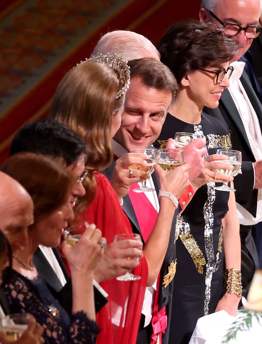President Emmanuel Macron winks at Princess Catherine of Wales during a toast at the State Banquet at Windsor Castle on July 08, 2025 in Windsor, England. 