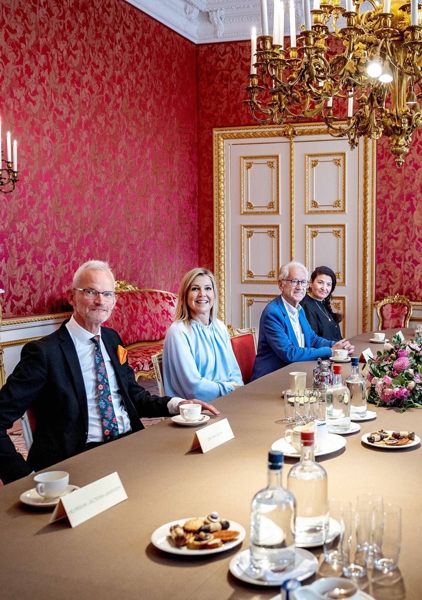 The Dutch queen opted for a fresh summer palette, combining soft pastel blue with crisp white tailoring for the intimate gathering at Noordeinde Palace.