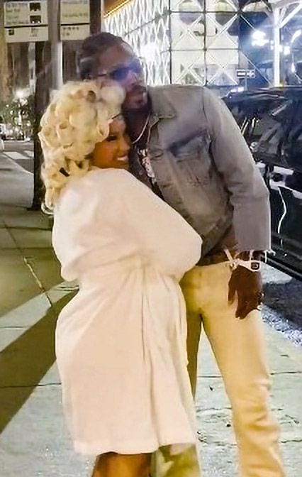 Cardi appeared to be on set when he surprised her
