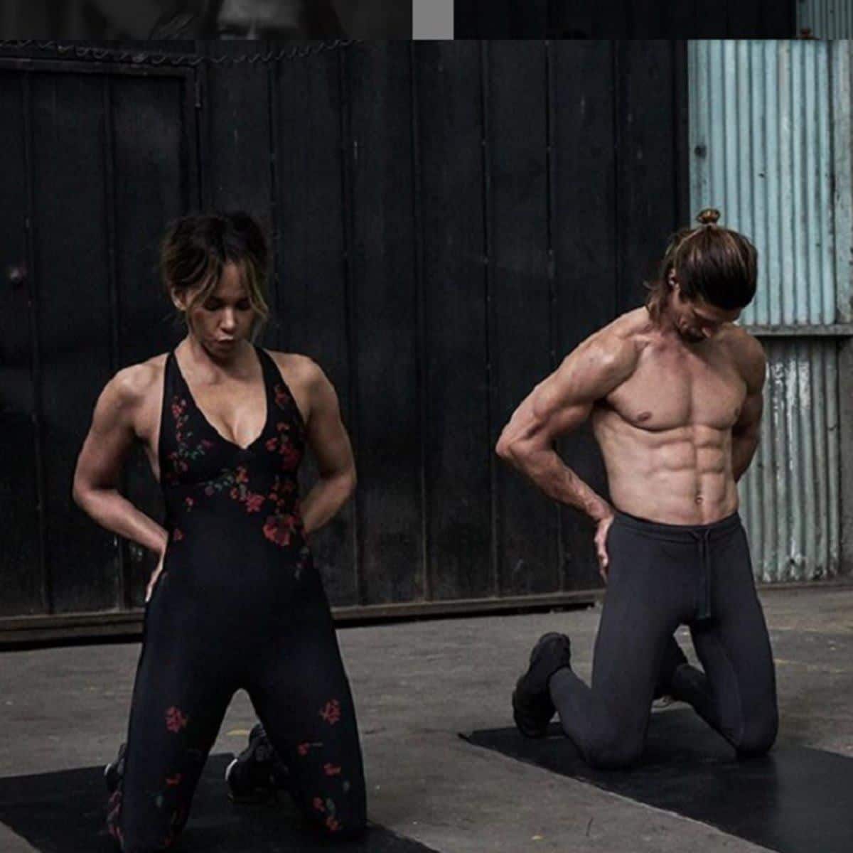 Halle Berry and Peter Lee Thomas stretching