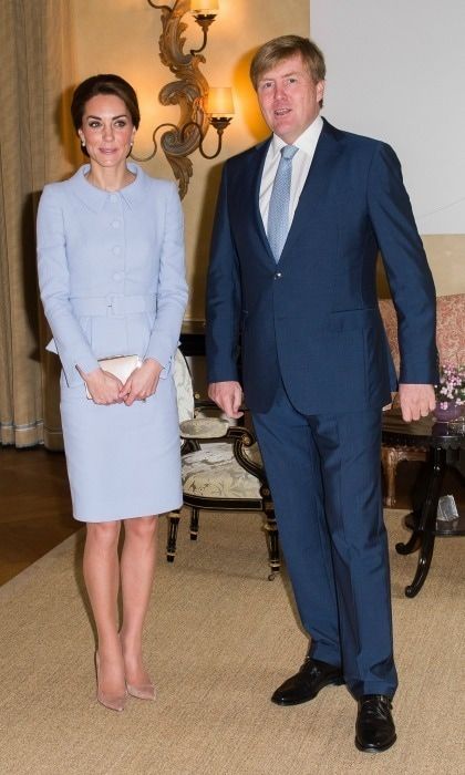 Kate completed her look with a L.K. Bennett Nina Clutch and praline Gianvito Rossi pumps.
Photo: Samir Hussein / PA Wire/Press Association Images