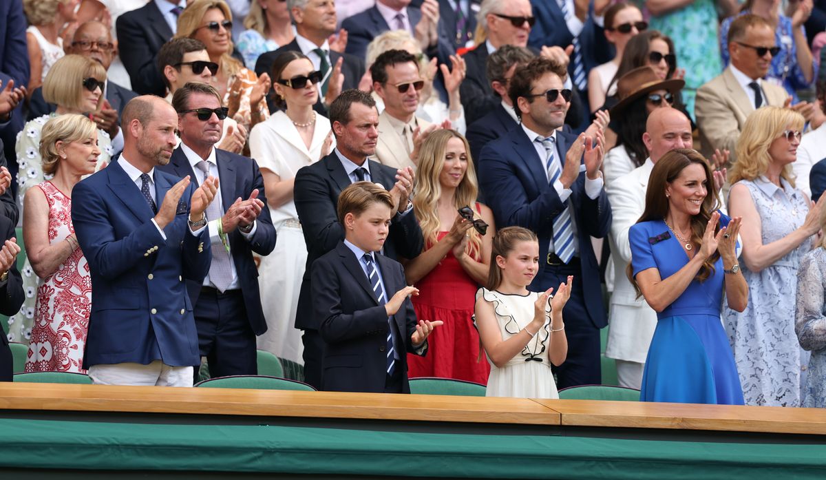LONDON, ENGLAND - JULY 13: Prince William, Prince of Wales Prince George of Wales, Princess Charlotte of Wales and Catherine, Princess of Wales, Patron of The AELTC applaud from the Royal Box prior to the Gentleman's Singles Final between Jannik Sinner of Italy and Carlos Alcaraz of Spain on day fourteen of The Championships Wimbledon 2025 at All England Lawn Tennis and Croquet Club on July 13, 2025 in London, England. (Photo by Julian Finney/Getty Images)
