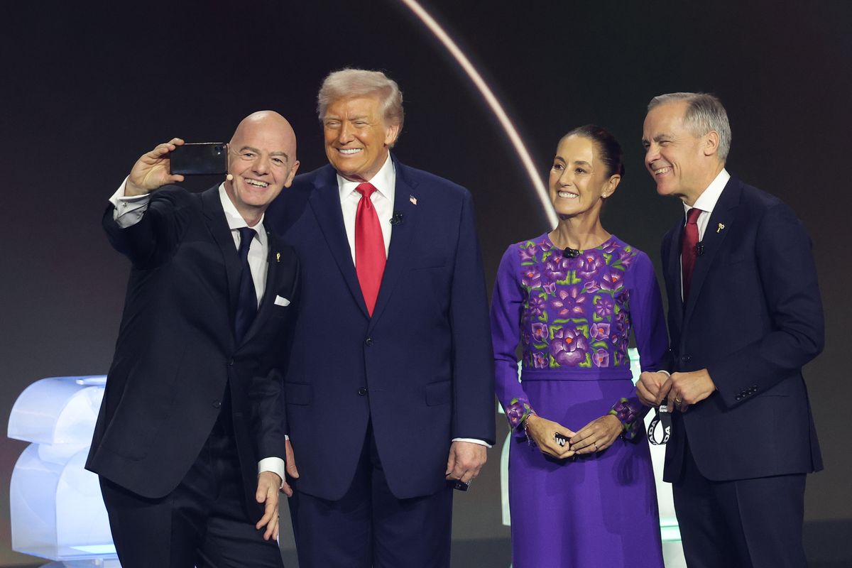 U.S. President Donald Trump, Claudia Sheinbaum, President of Mexico, and Mark Carney, Prime Minister of Canada, pose for a selfie with Gianni Infantino, President of FIFA.