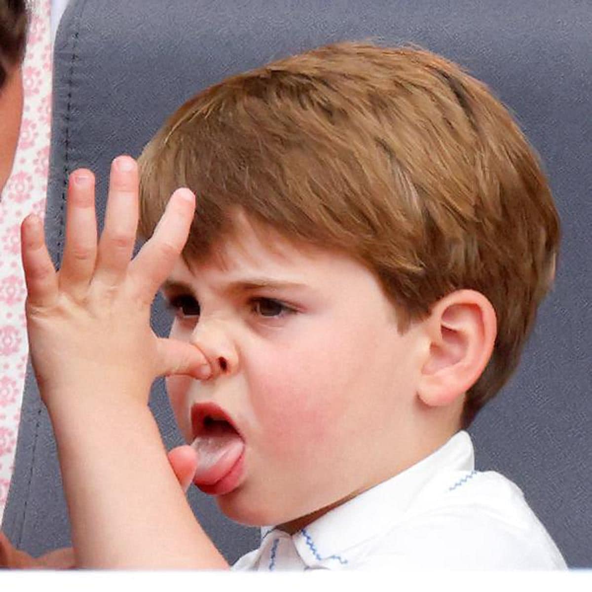 The four year old also made a silly face, sticking his tongue out at his mom.