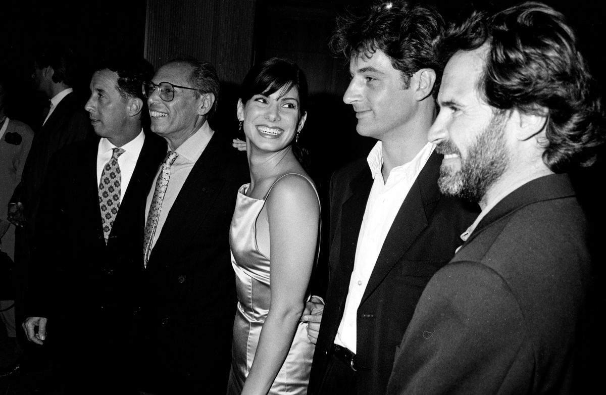 Sandra Bullock alongside the cast and crew of "The Net" in 1996