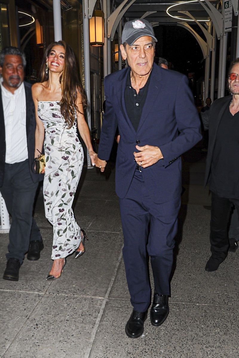 Amal Clooney shows off her summer style in cherry dress for date night with George Clooney