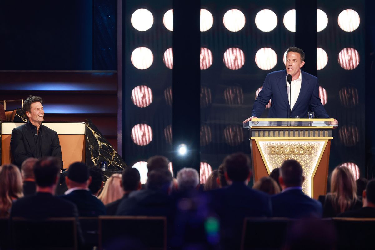 Tom Brady and Ben Affleck speak onstage during G.R.O.A.T The Greatest Roast Of All Time: Tom Brady for the Netflix is a Joke Festival at The Kia Forum on May 05, 2024 in Inglewood, California.  (Photo by Matt Winkelmeyer/Getty Images for Netflix)