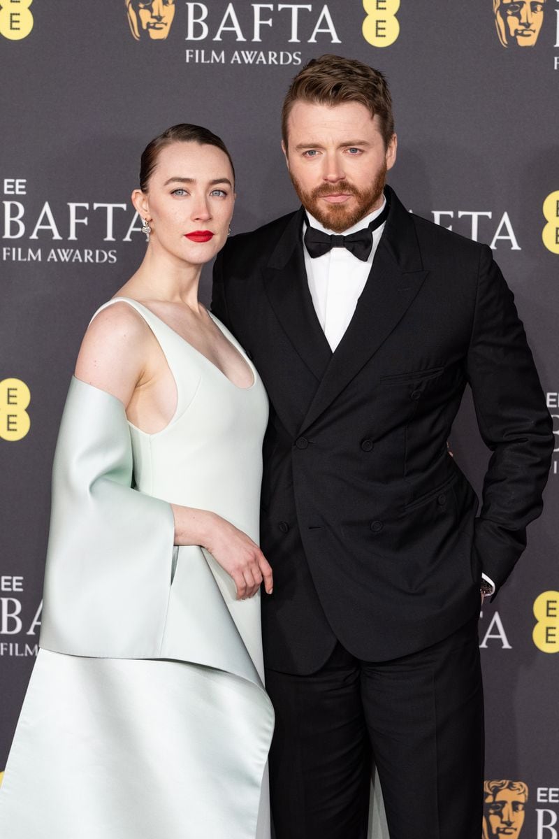 Saoirse Ronan and Jack Lowden attend the 2025 EE BAFTA Film Awards at The Royal Festival Hall on February 16, 2025 in London, England. (Photo by Jeff Spicer/Getty Images)